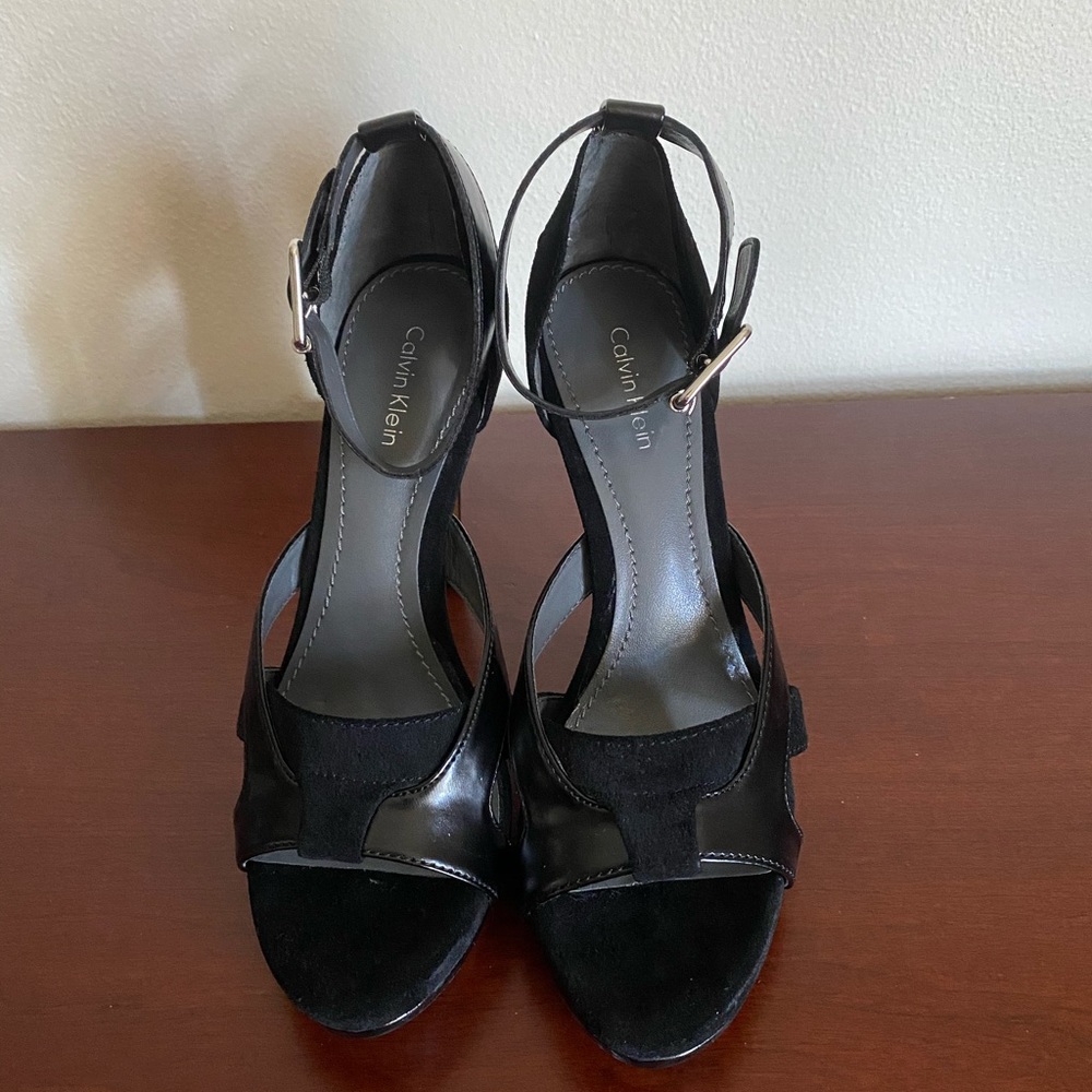 Black stiletto heels with ankle strap